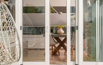 Modern sliding patio doors create a bright, seamless connection between home and garden.