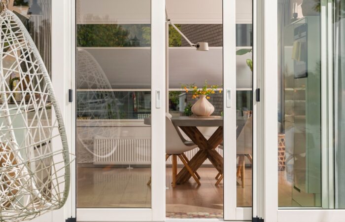 Modern sliding patio doors create a bright, seamless connection between home and garden.